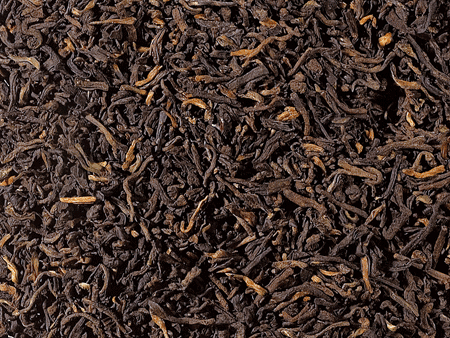 Losse Yunnan Pu-Erh thee – gefermenteerde bladeren met robijnrode infusie en aardse smaak